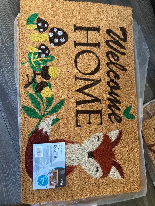  — Door mat