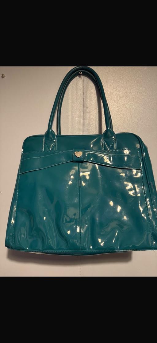  — Handbag