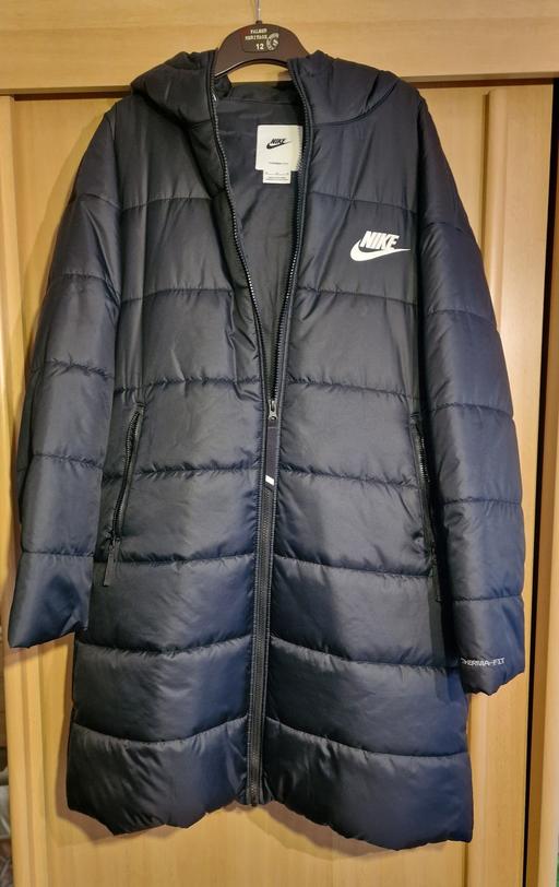  — Coat