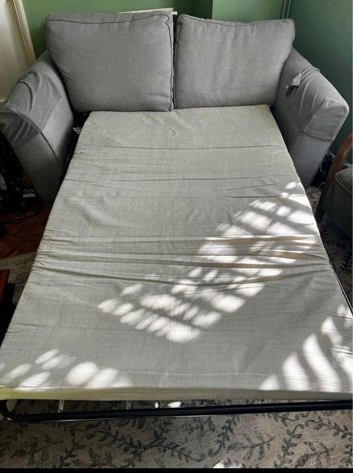  — Grey sofa bed