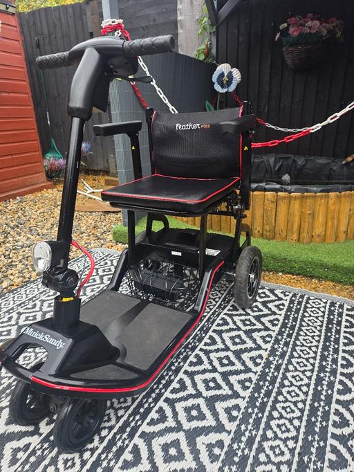  — mobility scooter feather fold