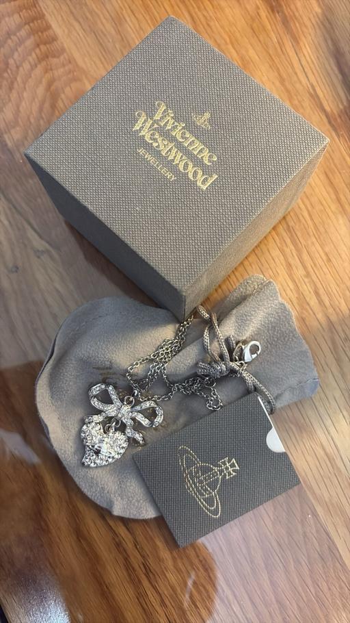  — diamond bow necklace