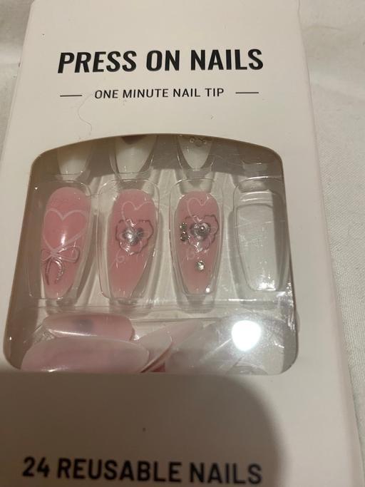  — Nails