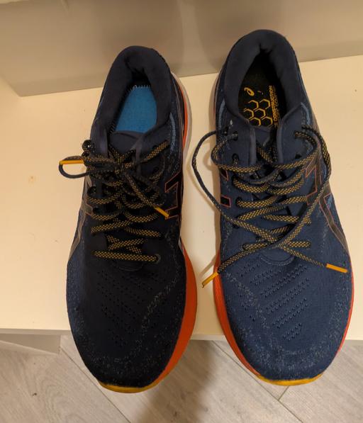  — ASICS Trainers