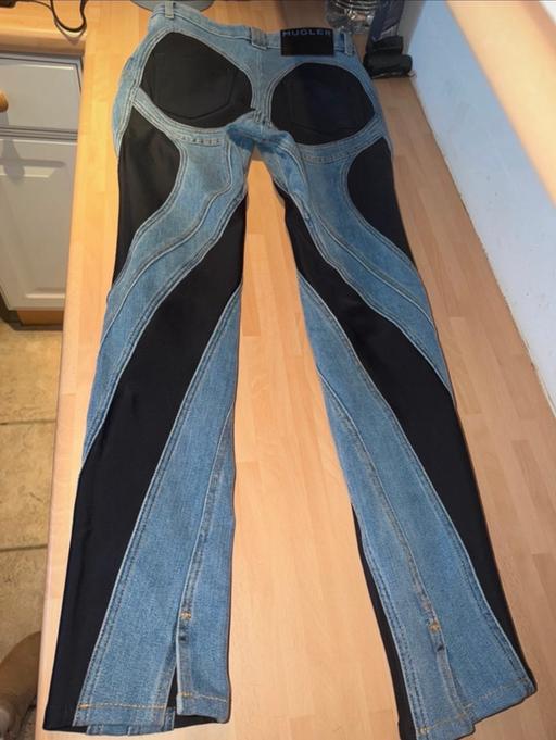  — Mugler spiral split hem jeans