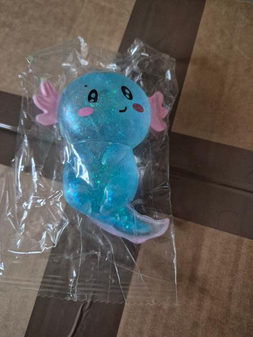  — new Blue Glitter Sugar Filled Axolotl Squishy