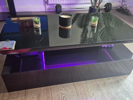  — Black glass coffee table with LED lighting