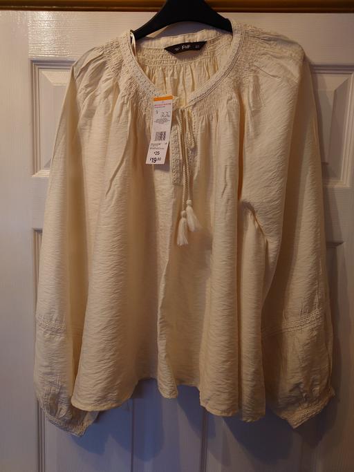  — Women's cream blouse size 18