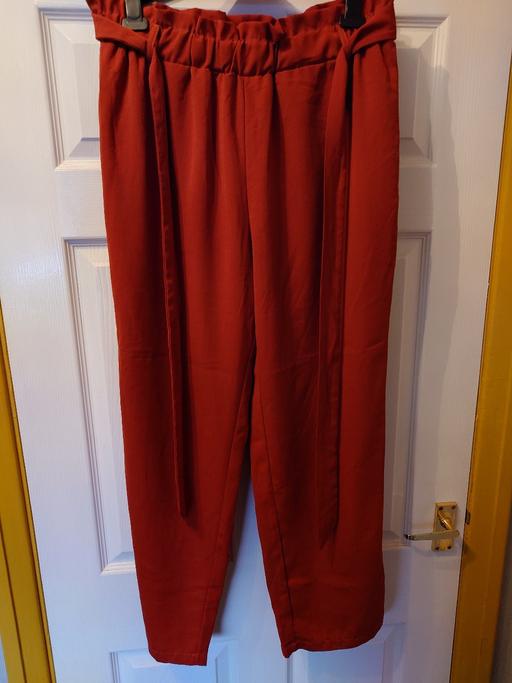  — Women's burnt orange shein trousers size 1XL