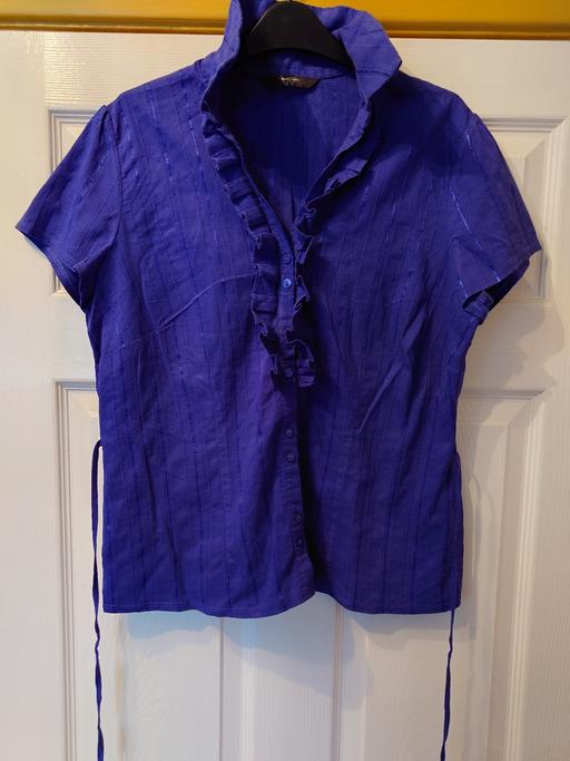  — Women's blue blouse size 16