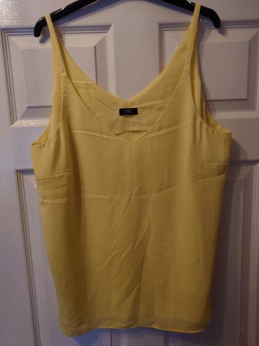  — Women's yellow strap top size 18