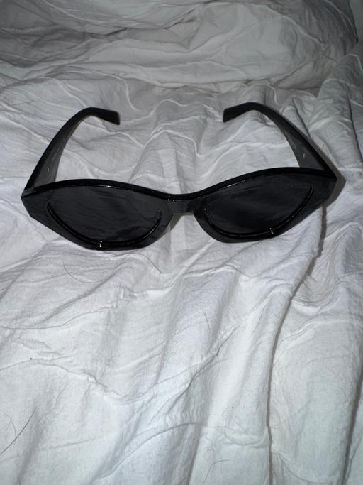  — Prada sunglasses