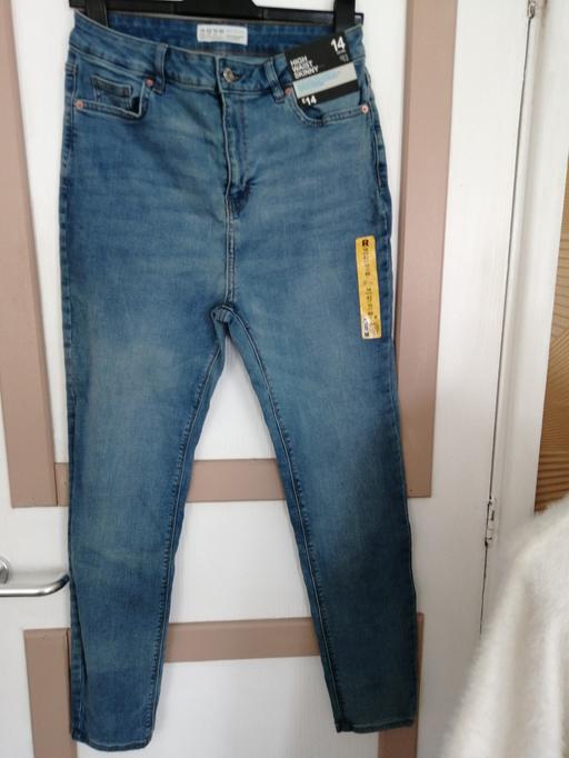  — ladies Jean's size *14*