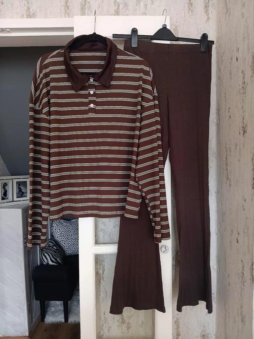  — Rugby top and fit and flare trousers