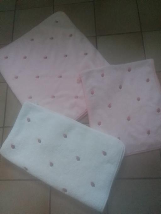  — THREE TOWELS