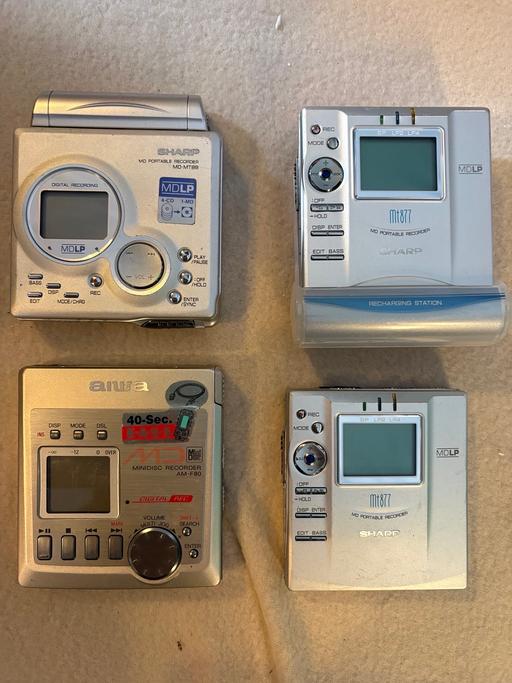  — Collection of 4 vintage portable MiniDiscs