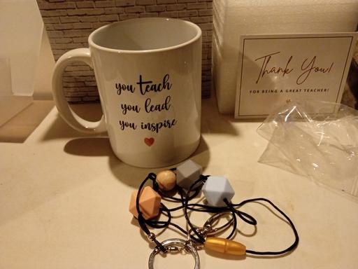  — brand new TEACHER MUG & CHARM SET