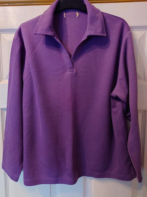 — Women's purple long sleeve top size M