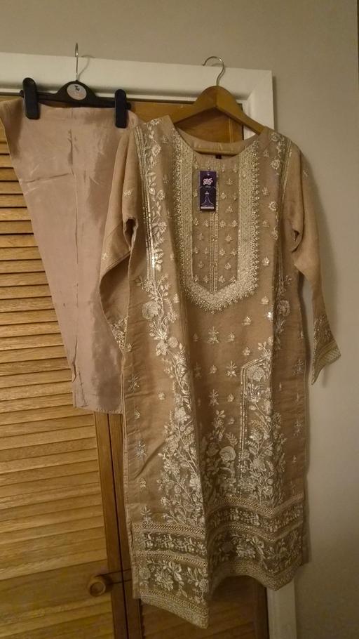  — Ladies asian size 12 suit