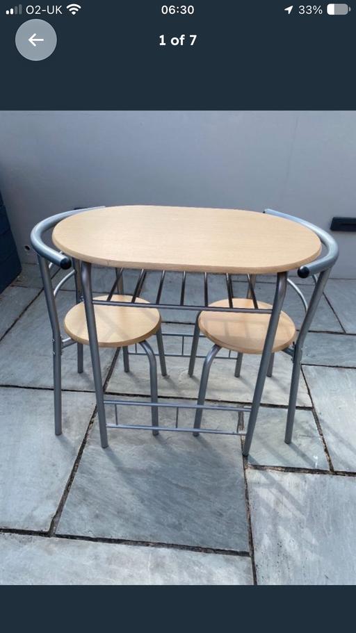  — Compact dining table and 2 chairs