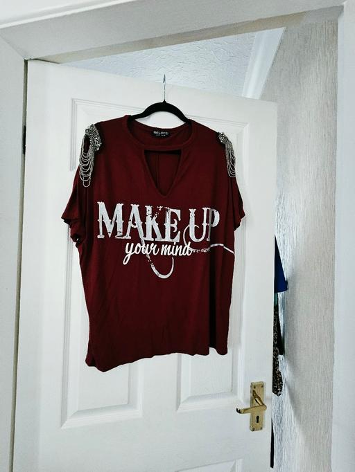  — beaded top, size 12 would fit upto a size 16.