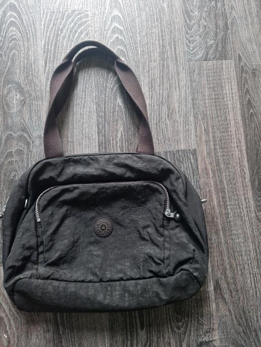  — Black Kipling bag