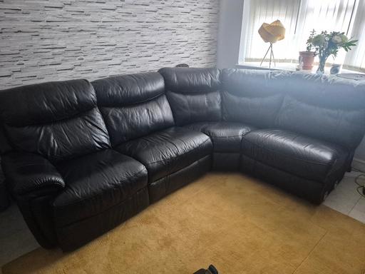  — Black leather settee