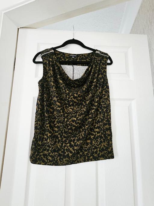  — Patterned top, zip detail, size 10/12..NEW