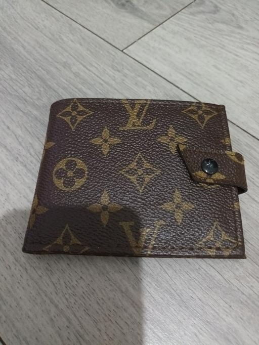 — BRAND NEW WALLET