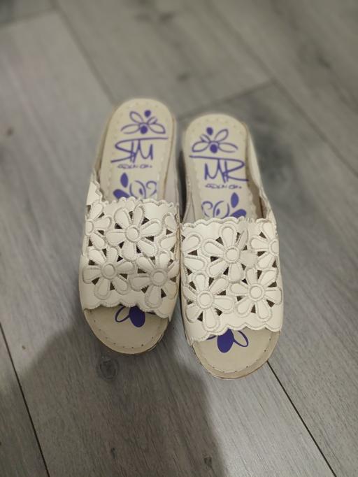  — BRAND NEW SLIPPERS