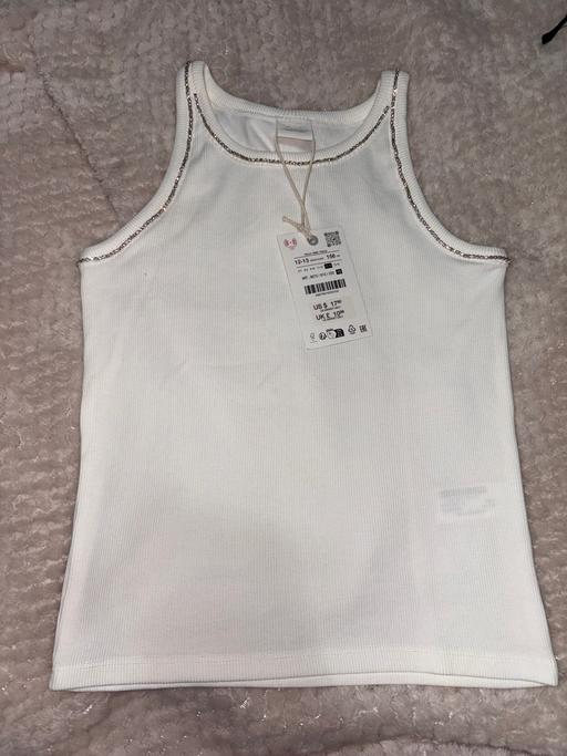  — Vest top