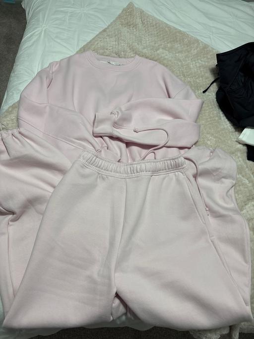  — Tracksuit
