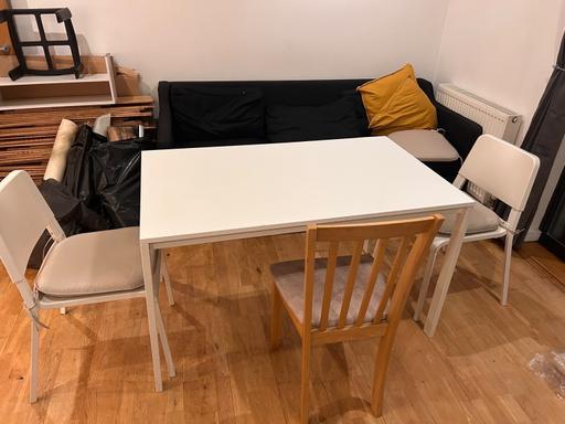  — Table and chairs