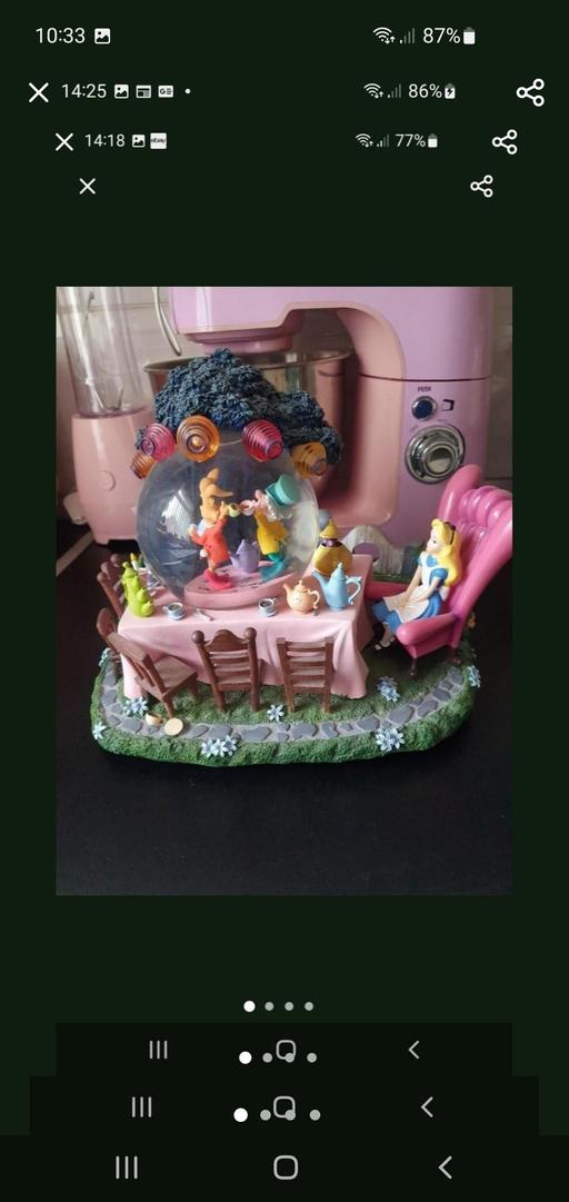  — large Disney snowglobe Alice in wonderland
