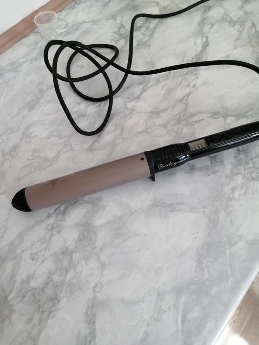  — Curler