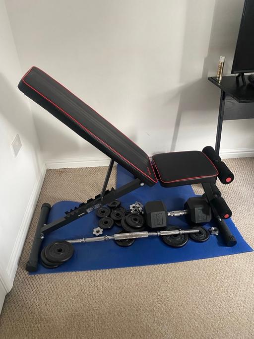  — Weight bench and weights