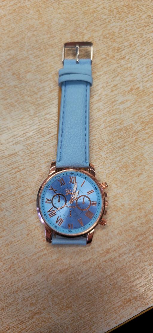  — Geneva quartz watch