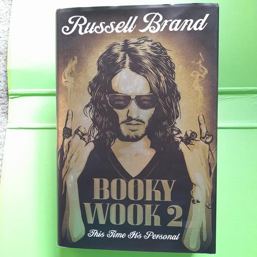  — RUSSELL BRAND