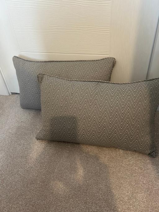  — Pair of grey rectangle cushions