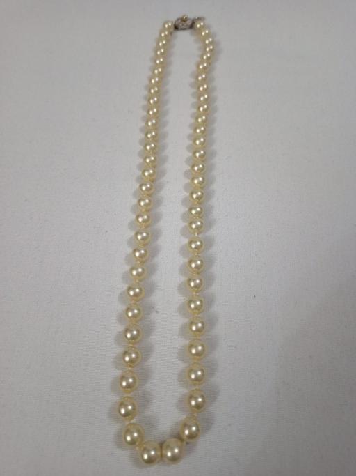  — FAUX PEARL NECKLACE WITH STERLING  CLASP.