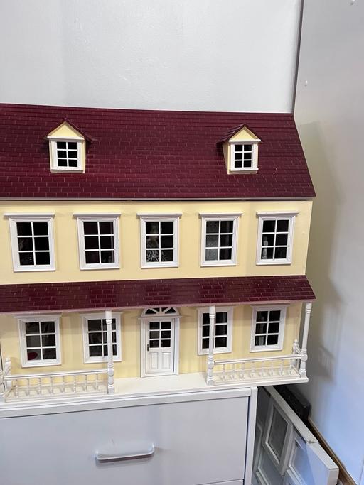  — DOLLS HOUSE
