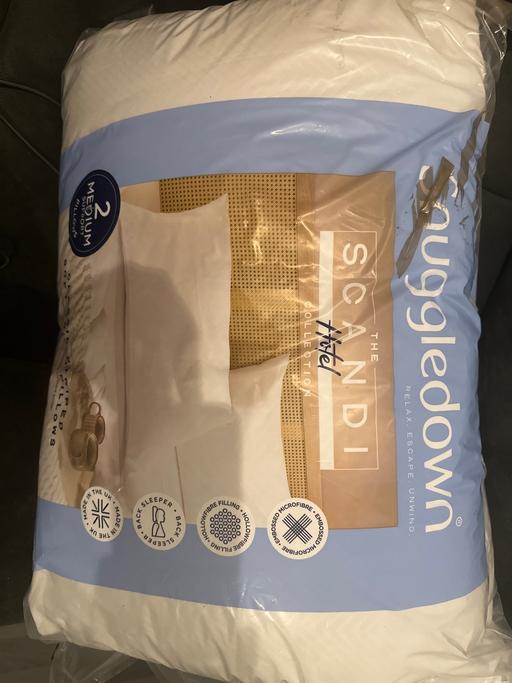  — Pack of two new snuggle down pillows