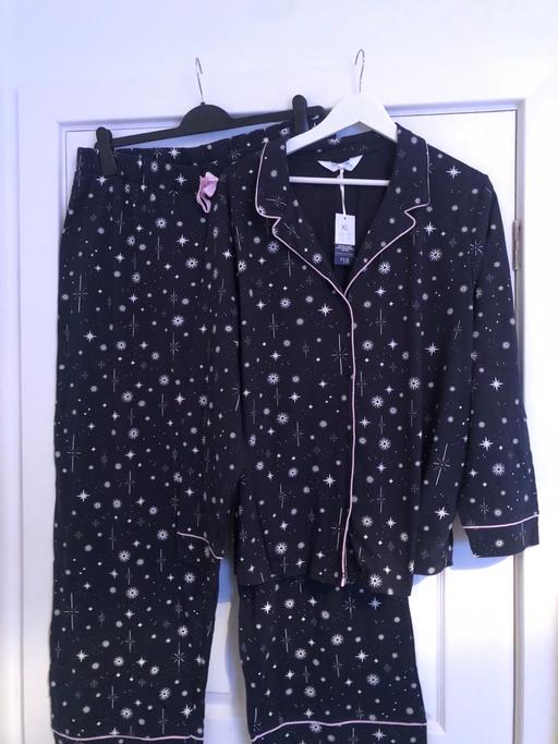  — Pjs