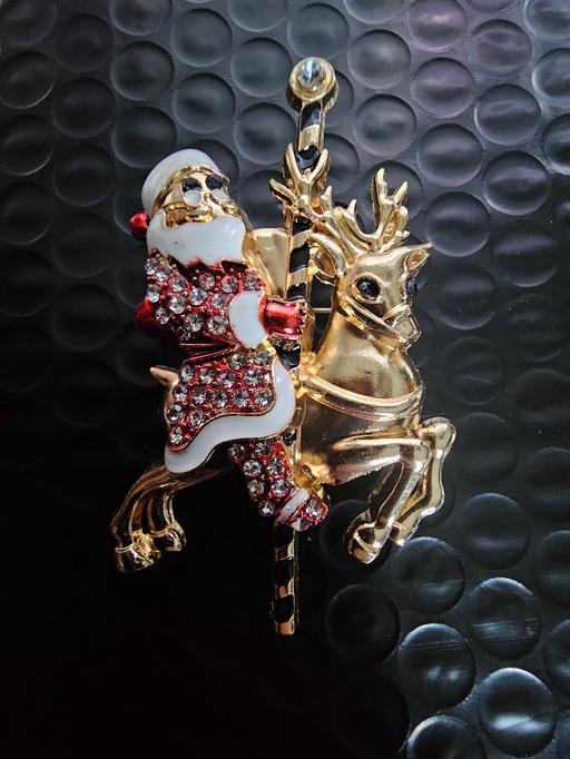 — brooch father christmas on reindeer