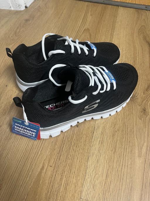  — Skechers