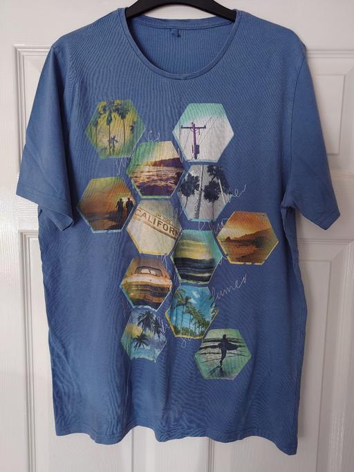  — Mens blue top size M