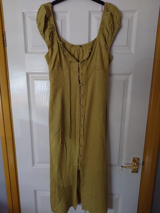  — Women's green dress size 14