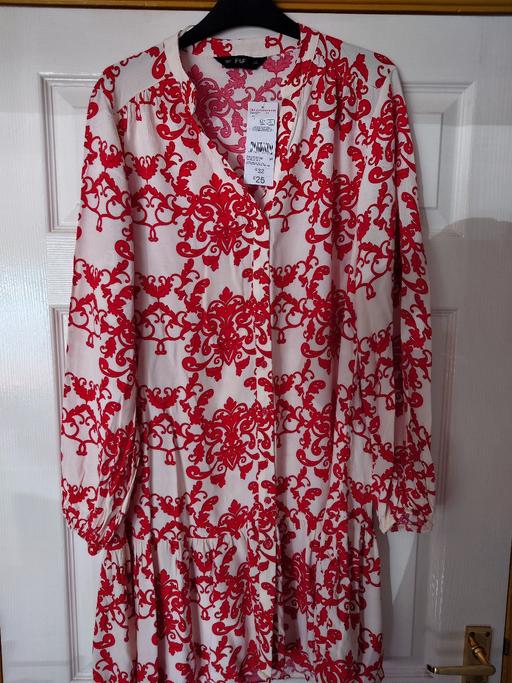  — Women's red/white patterned dress size 12
