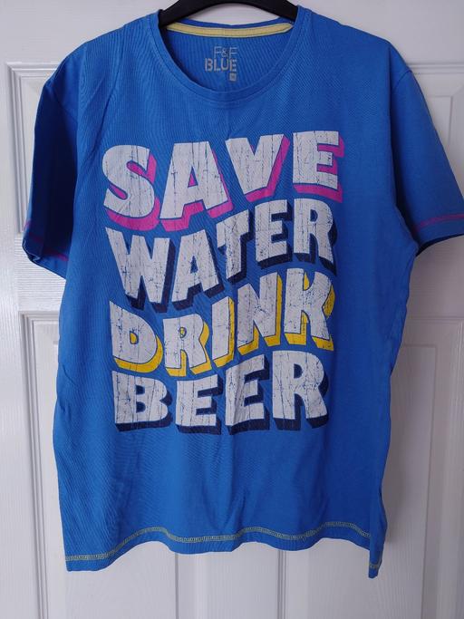  — Mens blue top size M