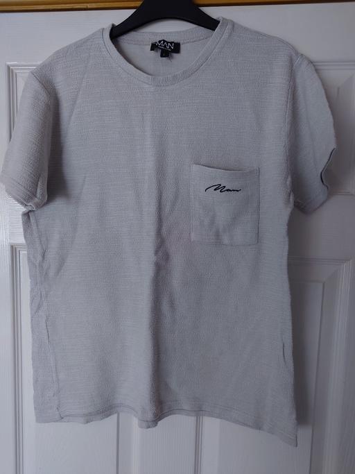  — Mens grey top size L